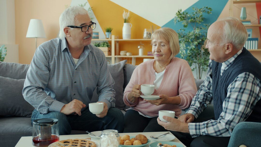 elderly friends chatting